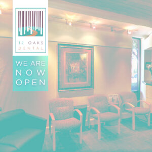 A dental clinic with a sign indicating it is open for dental care services.