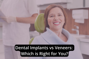 A woman is sitting in a dental chair and smiling. A dentist is holding a dental chart in the background. The text reads: "Dental Implants vs Veneers: Discover What's Right for You?