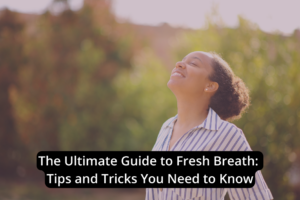 A woman with closed eyes smiles outdoors under the golden sunlight; text reads "The Ultimate Guide to Fresh Breath: Discover Tips and Tricks You Need to Know.